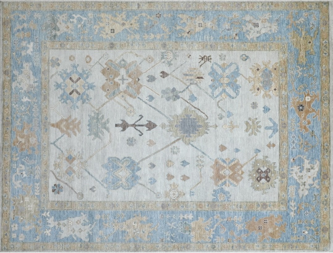 Featured pale blue Oushak rug
